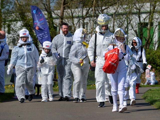 Would be record breakers arrive at Bay Road Park, on Saturday morning, for the successful world record attempt for the most people dressed as astronauts in one place. Photo: George Sweeney. DER2216GS – 198