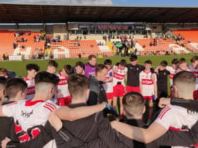 Derry Minor manager Martin Boyle talks to his players after their impressive Ulster CHampionship victory over Armagh in the Athletic Grounds