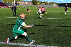 Practicing penalty kicks at the Derry City Easter Football Camp at the Brandywell Stadium. Picture by George Sweeney. DER2216GS-074