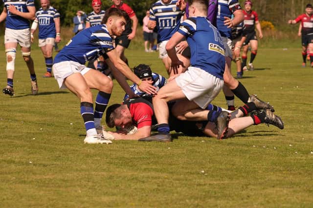 PROMOTION SECURED! Jody McMurray uses his strength to power over the line and secures the late win for Limavady in the promotion play-off on Saturday. (Photo: Steve Haslett)