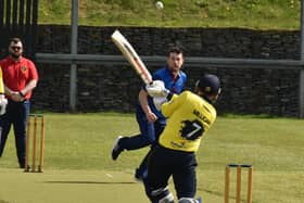 Fox Lodge's Jason Milligan hits a six during their win over Killyclooney. Picture by Lawrence Moore