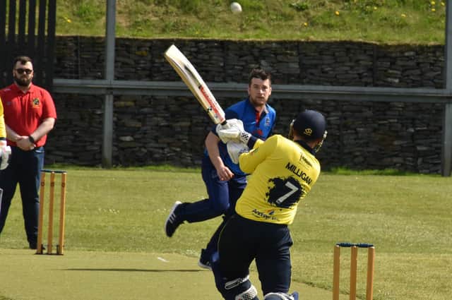 Fox Lodge's Jason Milligan hits a six during their win over Killyclooney. Picture by Lawrence Moore