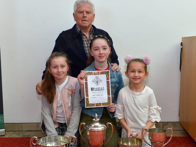 Feis Secretary Pat MacCafferty pictured with Eva Connolly winner of the George White Cup, May Connolly winner of the Jim Chapman Cup and Elowen Connolly winner of the Kathleen Henderson Cup and bursary at the Feis Doire Colmcille, held in Millennium Forum. DER2216GS 119