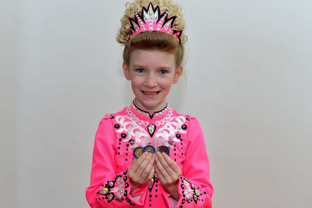 Amelia Dalton achieved first place Age 7 to 8 Reel, second place Light Jig and third place Single Jig at the Feis Doire Colmcille, held in Millennium Forum. DER2216GS  132