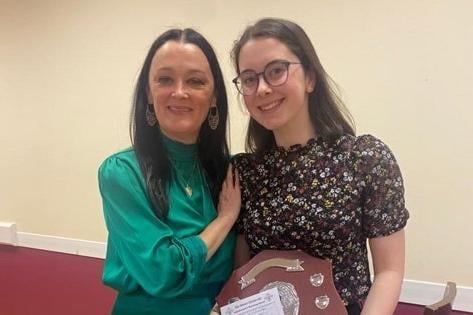 Rosie Byrne who won the Willie Conaghan Shield & Bursary for the Senior Repertoire at the Derry Feis, is pictured with feis adjudicator Bronagh