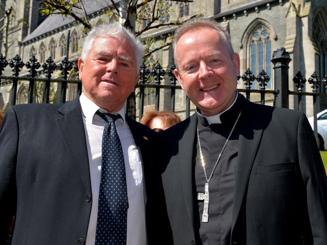 Pat MacCafferty pictured with Archbishop Eamon Martin Primate of All Ireland at the unveiling of a Blue Plaque in honour of his late father, James MacCafferty, outside his former home in Francis Street, Derry, on Saturday afternoon last.  Photo: George Sweeney. DER2216GS – 218