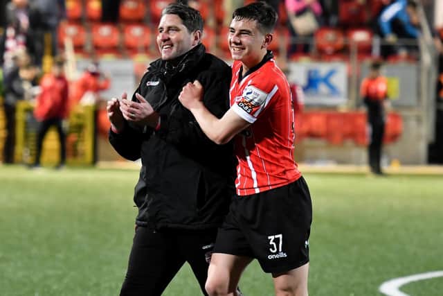 Derry City’s Daithí McCallion and manager Ruaidhrí Higgins celebrate Friday night’s win over UCD. Picture by Kevin Morrison/Event Images & Video