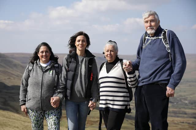 Sister Gina, Julia Bradbury, Mum Chrissi, and Dad Michael walking at Mam Tor in the Peak District