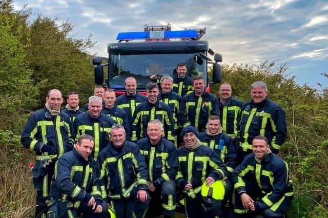 Brian Breslin pictured with his fire fighting colleagies in Carndonagh and Moville. Picture Liam Shields.