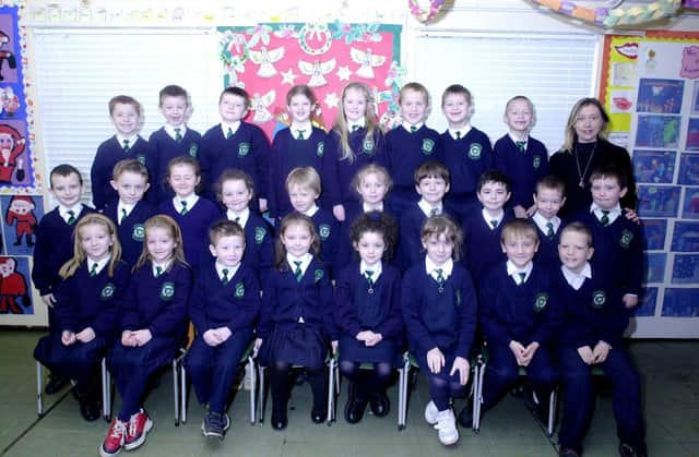 Primary 3 class at St Patrick's Primary School, Pennyburn, with their teacher, Mrs Hanley.