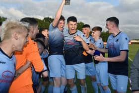 The Institute players celebrate after winning the 2019 O'Neill's Foyle Cup under-19's trophy.