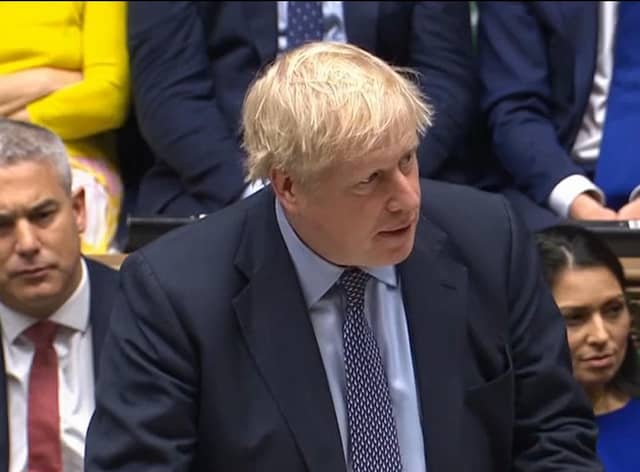 Boris Johnson hailing his Brexit Withdrawal Agreement and the Protocol in 2019.
