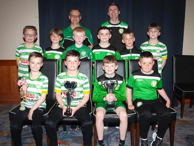 Top of the Hill Celtic U10 Winter Cup winners. Included are coaches Brendan Elliott and Martin Doherty. Picture by Jim McCafferty