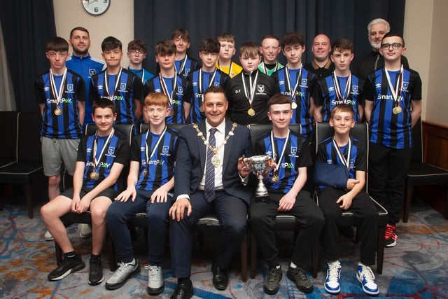 The Mayor, Graham Warke presenting Oxford United Stars FC U14s with the Winter Cup at Thursday night's awards. Oxford also won the National League and were D&D League runners-up. At back are coaches Ronan Kelly, Shaun Heaney and Raymond McDermott. Picture by Jim McCafferty