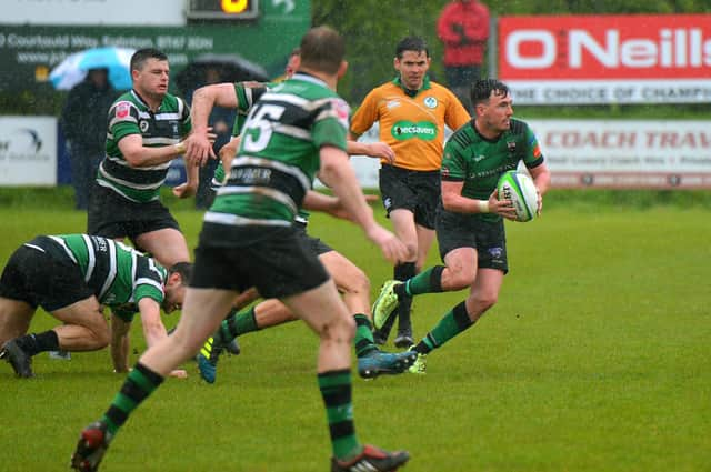 City of Derry's Jamie Millar evades a pack of Clonmel players at Judges Road on Saturday afternoon. (Photo: George Sweeney)