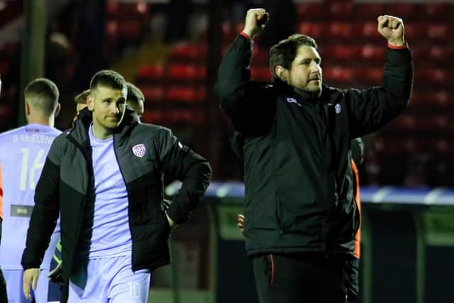 Derry City boss Ruaidhri Higgins and Patrick McEleney pictured after the Shantallow man's second half goal sealed victory at Tolka Park recently. Photograph by Kevin Moore.