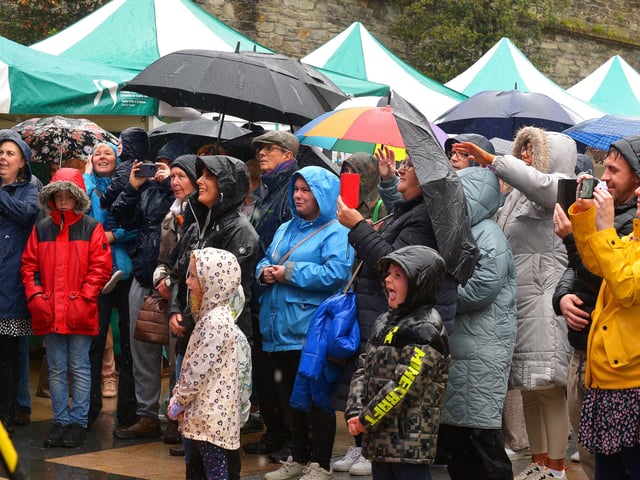 People gather at the Gay McIntyre Stage on Saturday afternoon for local school jazz band performances. Photo: George Sweeney.  DER2217GS – 128
