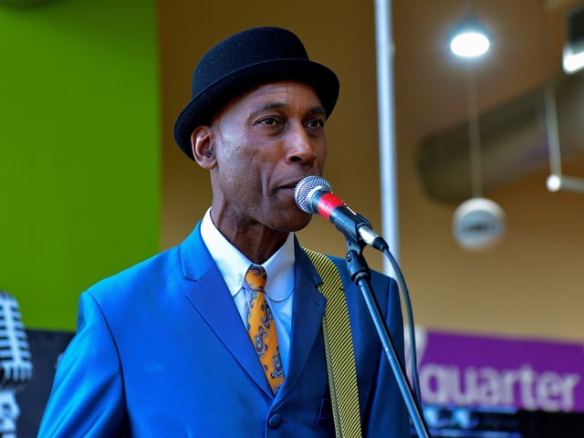 David Parry guitarist and vocalist with Ricky Cool and the In Crowd, performs in Foyleside Shopping Centre, during the Jazz Festival weekend. Photo: George Sweeney. DER2217GS – 046
