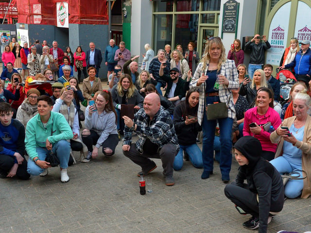 Revellers enjoy the musical entertainment from Mr Wilson’s Second Liners in Waterloo Street over the Jazz Festival weekend. Photo: George Sweeney. DER2217GS – 086