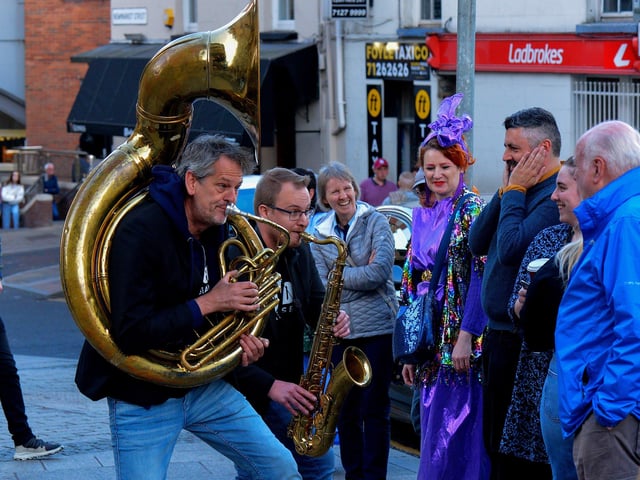 Patrick Witberg and Sam Thomas, from the JayDee Brass Band, entertain revellers at the Millennium Forum steps during the Jazz Festival weekend. Photo: George Sweeney.  DER2217GS – 094
