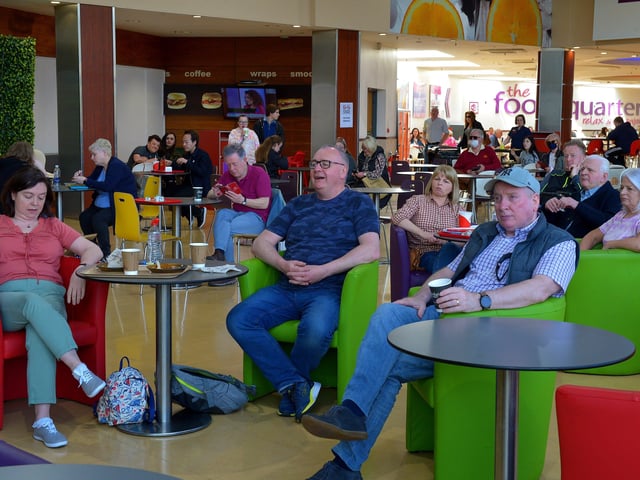 Revellers enjoy a performance of Ricky Cool and the In Crowd, in Foyleside Shopping Centre, during the Jazz Festival weekend. Photo: George Sweeney. DER2217GS – 043