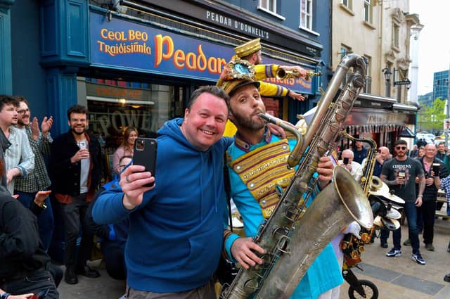 Enjoying the craic and music in Waterloo Street over the Jazz Festival weekend. Photo: George Sweeney. DER2217GS – 084