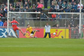 Derry's Shane McGuigan scores a first half penalty against Tyrone at Healy Park on Sunday afternoon. (Photo: George Sweeney)