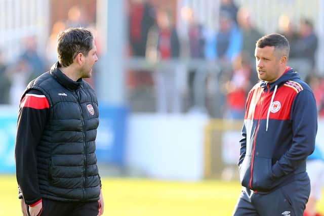 Derry City boss Ruaidhri Higgins in conversation with St Pat's manager Tim Clancy ahead of last Friday night's clash at Richmond Park. Photograph by Kevin Moore.