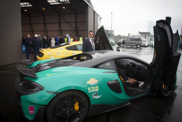 The Mayor, Graham Warke checks out one of the super cars at Saturdayâ€TMs Bear Run 74 event in City of Derry Airport.