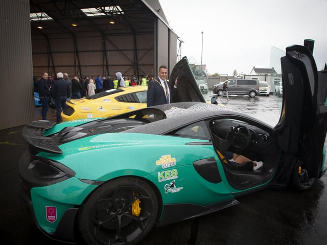 The Mayor, Graham Warke checks out one of the super cars at Saturdayâ€TMs Bear Run 74 event in City of Derry Airport.