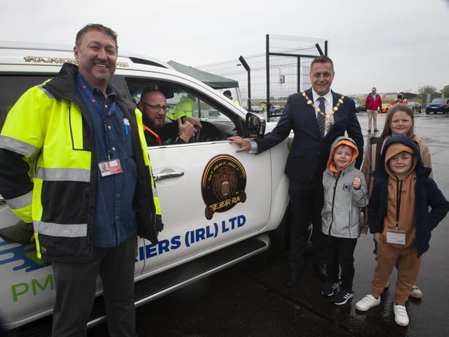LAUNCH OF THE BEAR RUN 74!. . . . . The Mayor of Derry City and Strabane District Council, Graham Warke pictured at City of Derry Airport on Saturday morning welcoming the safety car driven by Joe Jackson, leading the convoy through the gates of the airport for the Bear Run 74 VIP event. On right is Steve Frazer, managing director, CODA.