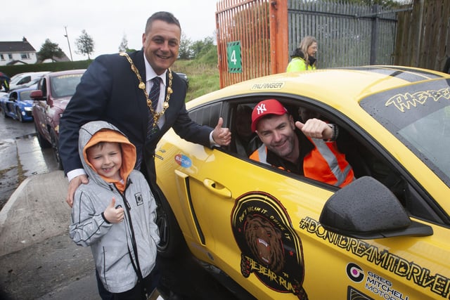 The Mayor Graham Warke welcoming the Bear Run 74 organiser Keith Bear to City of Derry Airport on Saturday morning. A convoy of cars made their way from Lifford earlier in the morning.