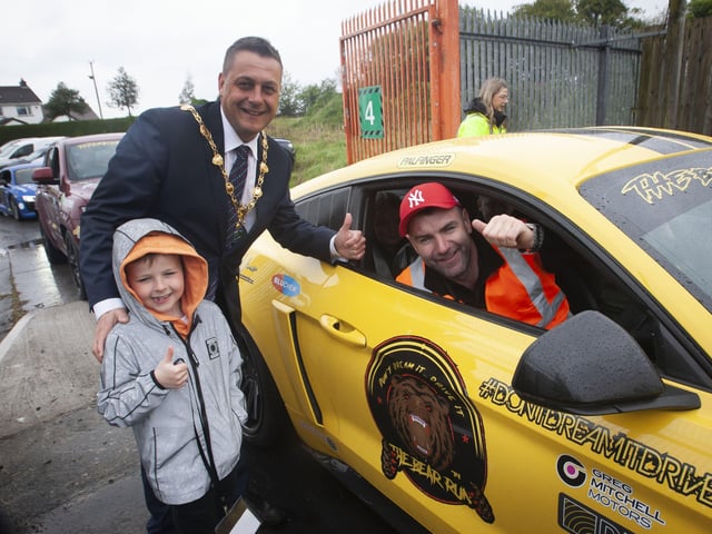 The Mayor Graham Warke welcoming the Bear Run 74 organiser Keith Bear to City of Derry Airport on Saturday morning. A convoy of cars made their way from Lifford earlier in the morning.