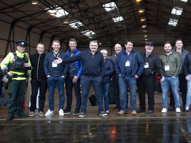 Some of the drivers take shelter from the rain at Saturdayâ€TMs Bear Run 74 event.