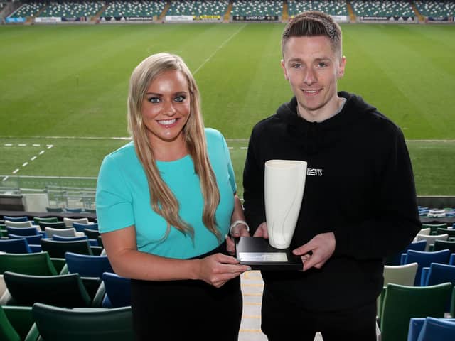 Ruth Gorman, chairwoman of the Northern Ireland Football Writers’ Association (NIFWA) presents Ryan Curran with the Danske Bank Player of the Month for April.
