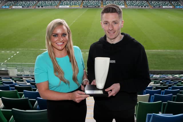 Ruth Gorman, chairwoman of the Northern Ireland Football Writers’ Association (NIFWA) presents Ryan Curran with the Danske Bank Player of the Month for April.
