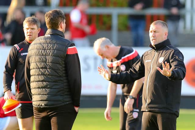 Derry City assistant boss Alan Reynolds talks to manager Ruaidhrí Higgins last week before their win over St Patrick’s Athletic. Picture by Kevin Moore/MCI