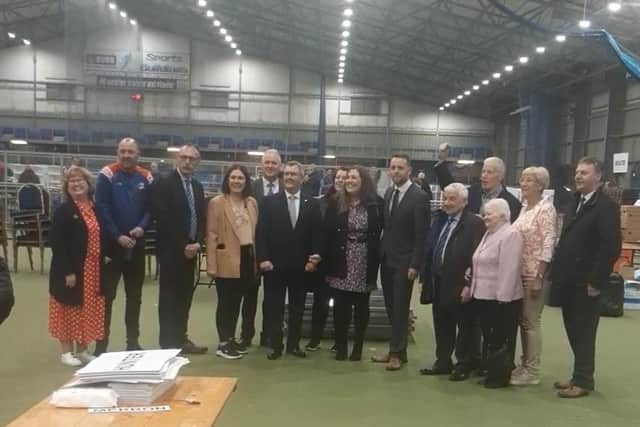 Gary Middleton with his wife Julie and DUP colleagues including party leader Jeffrey Donaldson.