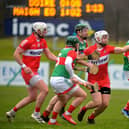 Eamon McGill comes under pressure from Mayo players during Derry's National League victory at Owenbeg. The two sides meet this weekend with the winner assured of a spot in the Christy Ring Cup Final. (Photo: George Sweeney)