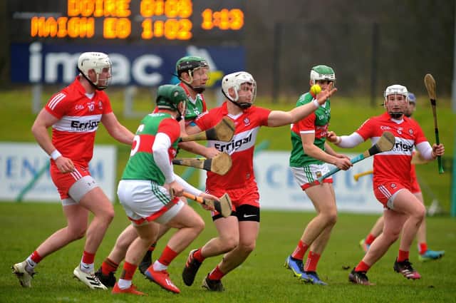 Eamon McGill comes under pressure from Mayo players during Derry's National League victory at Owenbeg. The two sides meet this weekend with the winner assured of a spot in the Christy Ring Cup Final. (Photo: George Sweeney)