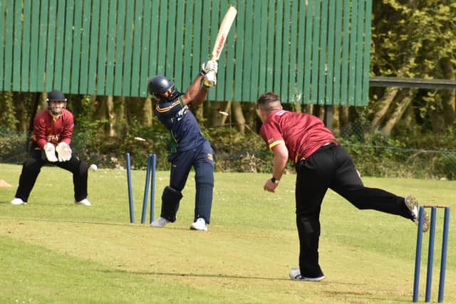 St Johnston's Babu is bowled by Bready skipper Davy Scanlon. Picture by Lawrence Moore