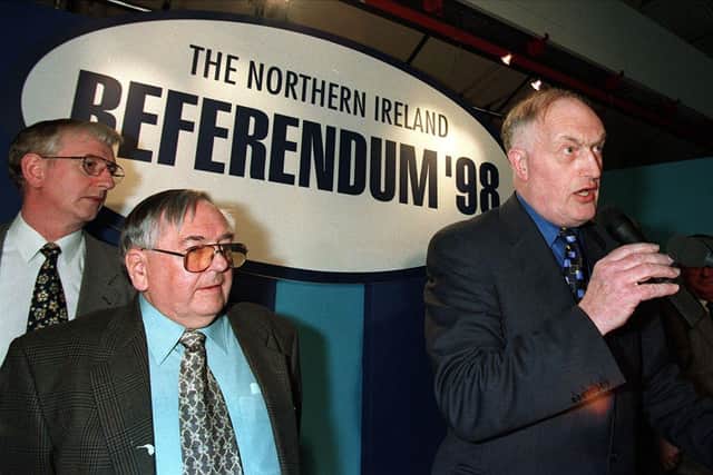Chief Electoral officer Pat Bradley announces the result of the Good Friday Agreement Referendum at the King's Hall.