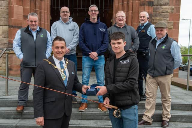 Alderman Graham Warke, Mayor of Derry City and Strabane District Council who has hosted a reception for Damien Wilson Irish Rep in F.I.S.H (fishing in support of Hope) where he was presented with a commemorative piece of crystal. Damien was also joined by members of FROG, Foyle River Catchment Outdoor Group. Included are Joe Owens, Robbie Gillespie, Thomas Campbell, Daniel English and Teddy Divin. Picture by Martin McKeown