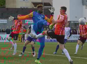 Danny Lafferty is beaten to the ball by St Pat’s keeper Joe Anang during Monday’s scoreless draw at Brandywell.