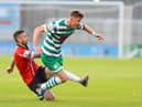 Derry City defender Danny Lafferty slides in to win possession from Shamrock Rovers captain Ronan Finn. Picture by Kevin Moore/MCI