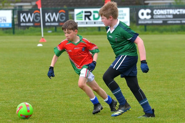 Sacred Heart PS 'A' take on Good Shepherd PS in the recent Doire Trasna Schools Cup competition. Picture by George Sweeney.