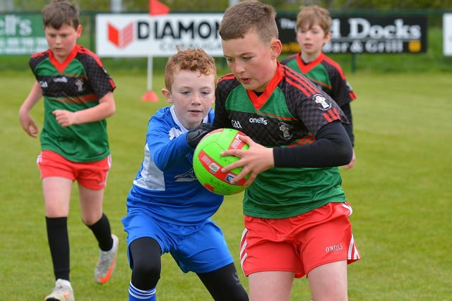 St Columba’s in action against Our Lady of Fatima in the recent Doire Trasna Schools Cup competition. Picture by George Sweeney.