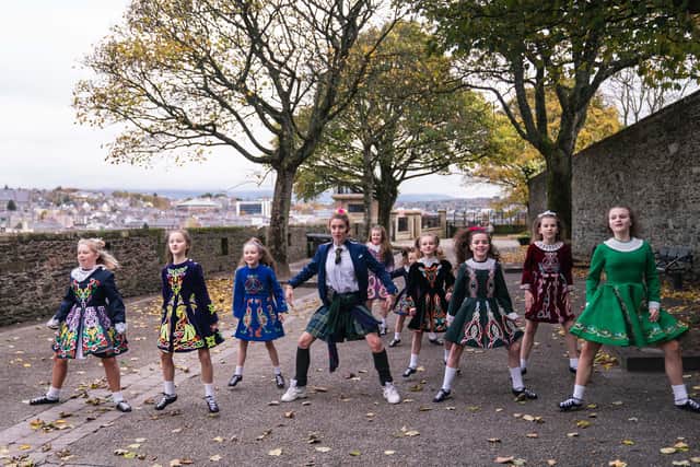 Orla McCool (Louisa Clare Harland) and Irish dancers. (Peter Marley)