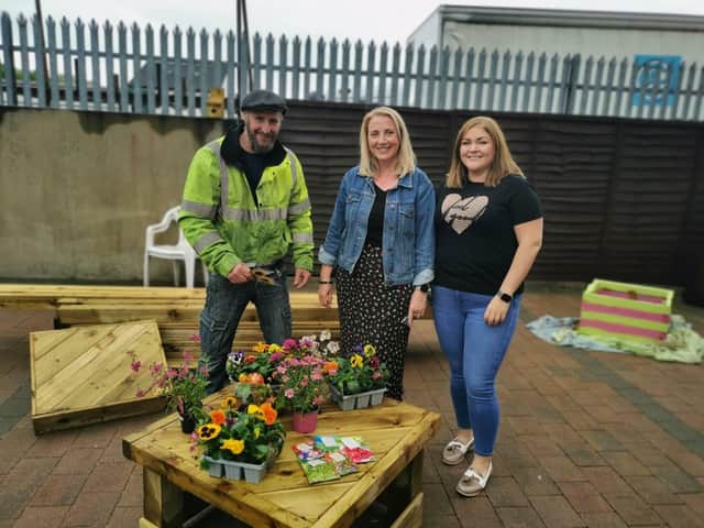 Richard Duffy with Anna McCloskey and Laura Brown.
