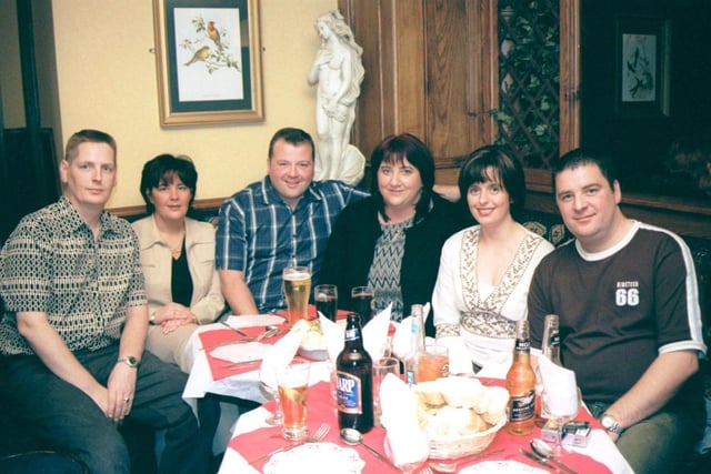 Members and guests at the Argyle Arms Golf Society presentation dinner. From left are Paul McCallion, Majella McCallion, Ciaran Bell, Catherine Bell, Donna McNally and Ciaran McNally. 281102HG3
